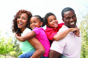 Happy Family In Park