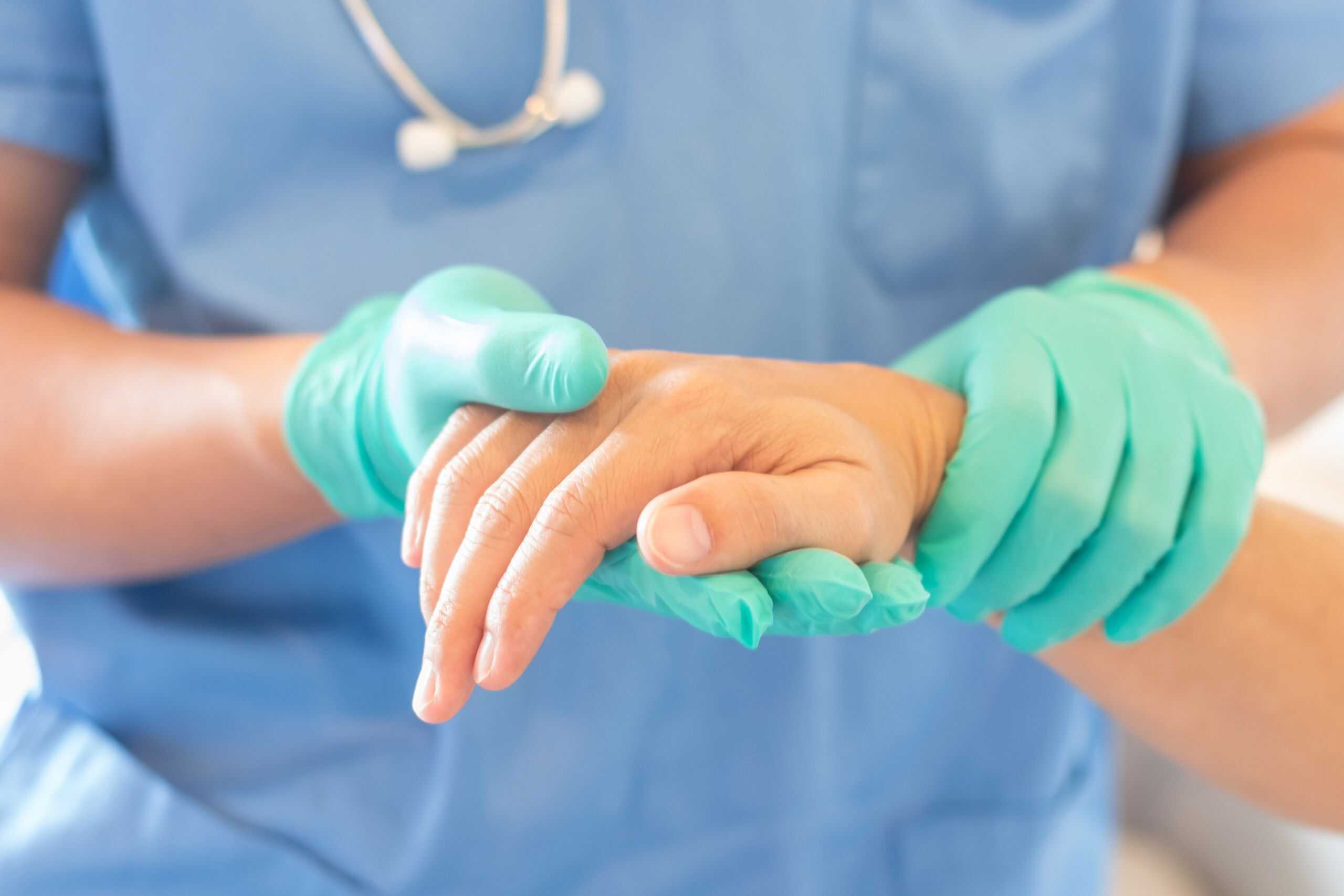 Surgeon, surgical doctor, anesthetist or anesthesiologist holding patient’s hand for health care trust and support in professional ER surgical operation, medical anesthetic safety, healthcare concept Surgeon, surgical doctor, anesthetist or anesthesiologist holding patient's hand for health care trust and support in professional ER surgical operation, medical anesthetic safety, healthcare concept